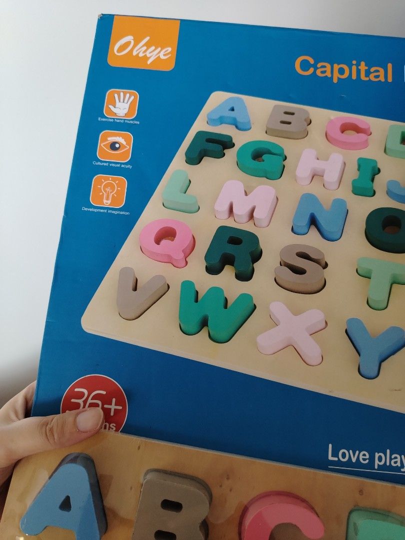 Letter wooden puzzle (Category: Infant Playtime) located in Singapore. Submitted by imrudelikethis (Listing ID 1378737378, Image 2). Description: Please clean before using Long term storage.