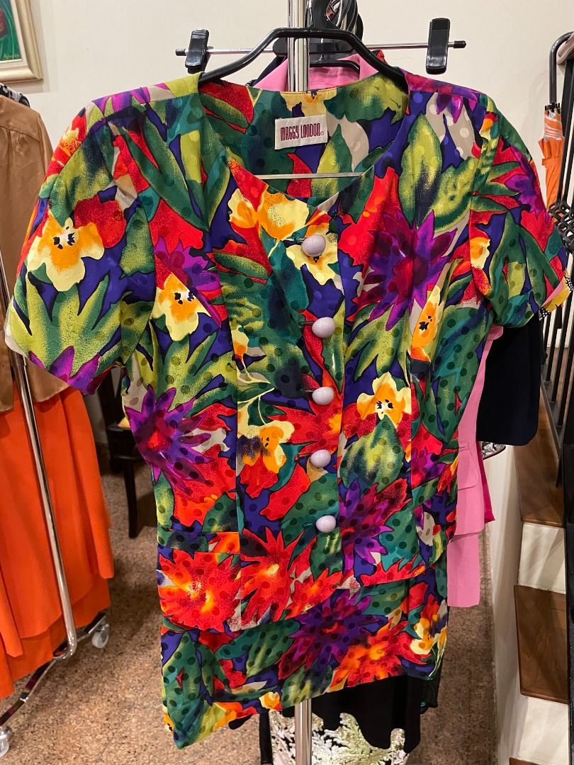 Maggy London Vintage Floral Print Blouse and Skirt Set - can fit size S (Category: Blouses) located in Singapore. Submitted by panadol73 (Listing ID 1378754943, Image 1). Description: Beautiful vintage skirt with a vibrant floral print. Features a colourful design with red, yellow, purple, and green flowers. The skirt is in good condition, perfect for adding a pop of colour to your wardrobe. A unique piece for any vintage lover..