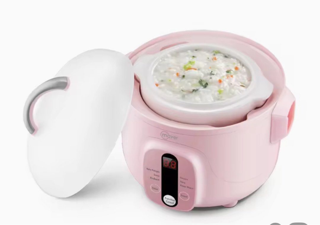 Personal Double Boiler - Pink (Category: Other Kitchen Appliances) located in Singapore. Submitted by katiefoong (Listing ID 1378808253, Image 2). Description: This Mayer double boiler MMDB700 is perfect for preparing porridge, soup, and desserts. It features a timer and preset functions for convenience. The pink color and compact design make it a stylish addition to any kitchen. Includes the inner ceramic pot. 0.7L capacity .