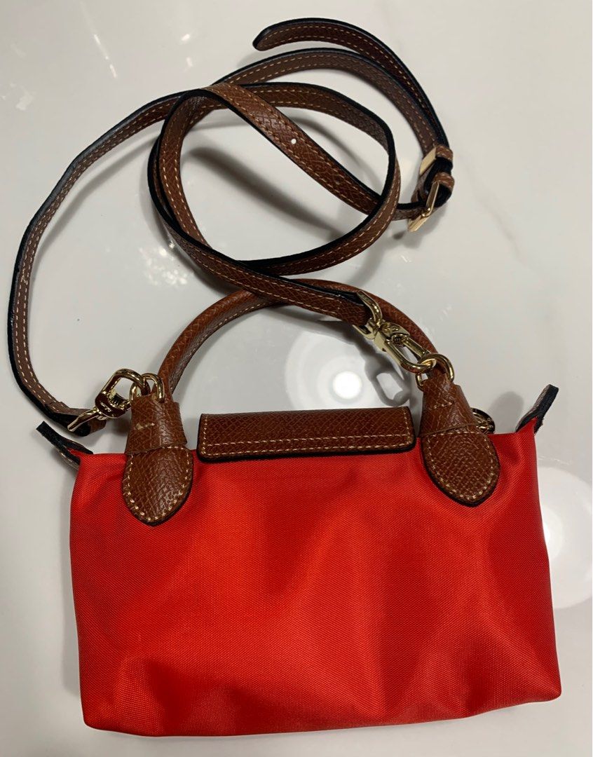 Mini Longchamp in Red (Category: Luxury Bags & Wallets) located in Manila. Submitted by _girlfinds (Listing ID 1378734729, Image 3). Description: 👜 LONGCHAMP LE PLIAGE – JAPAN SOURCED Elevate your daily style with this classic and functional Longchamp tote. 📍 Sourced directly from Japan – self authentication with the provided photos, premium quality. ➕ Want a comfier grip? 💼 Add ₱300 for thin strap upgrade (optional) • Not included by default 