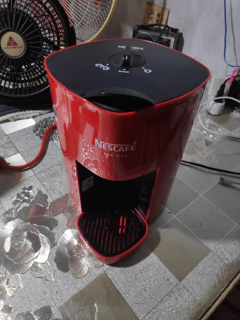 Nescafe Red Mug Coffee Maker (Category: Coffee & Tea Tableware) located in Quezon City. Submitted by j.c.declutter (Listing ID 1378886037, Image 1). Description: Issue: Water not pouring.