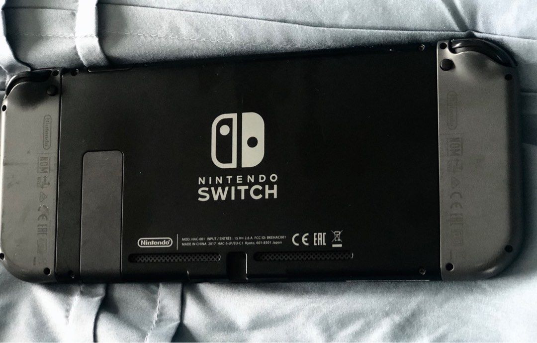 Nintendo Switch 1 (Category: Nintendo) located in Makati City. Submitted by quickbrownfox.777 (Listing ID 1378920784, Image 2). Description: Selling a Pre-owned Nintendo Switch 1. Complete with box, two original controllers, charger and cradle/charger. Never modded, all original software. .