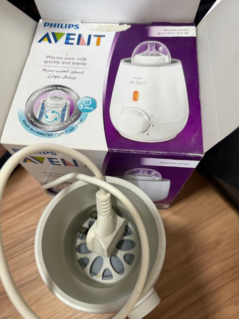 Philips Avent Bottle Warmer (Category: Breastfeeding & Bottle Feeding) located in Singapore. Submitted by kairos2000 (Listing ID 1378818031, Image 2). Description: - Philips Avent bottle warmer - Warms milk quickly and evenly - Comes with original box - In good working condition - Perfect for busy parents.