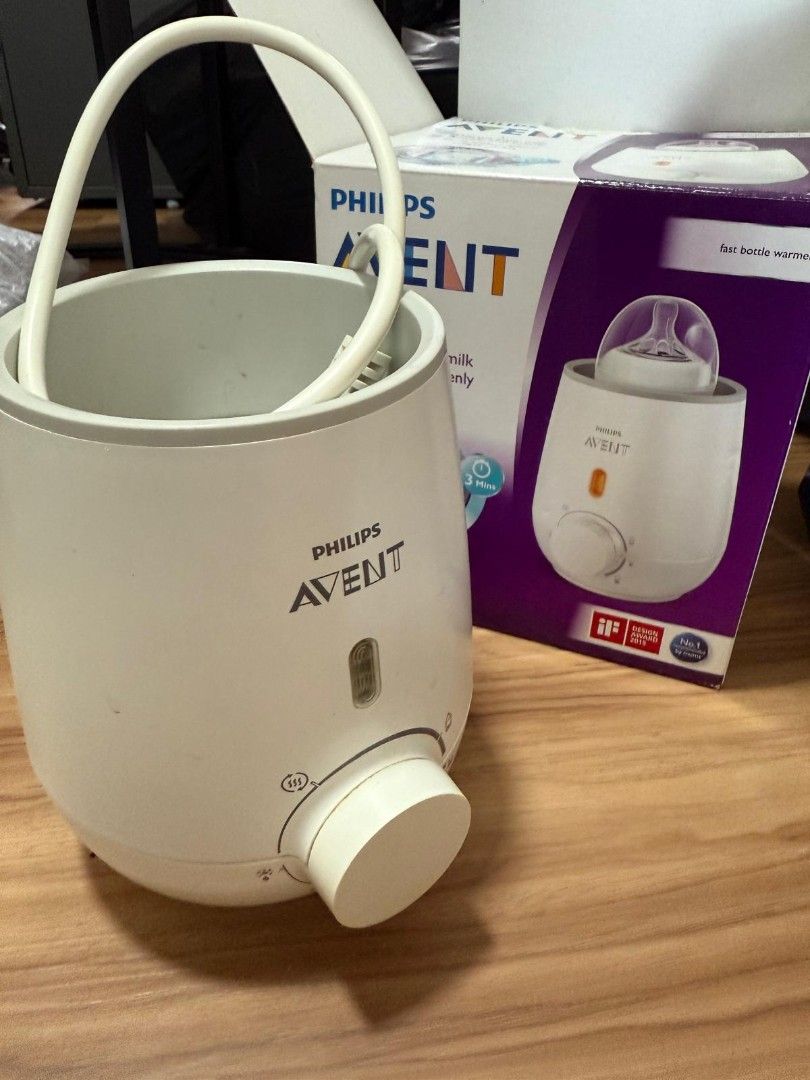 Philips Avent Bottle Warmer (Category: Breastfeeding & Bottle Feeding) located in Singapore. Submitted by kairos2000 (Listing ID 1378818031, Image 1). Description: - Philips Avent bottle warmer - Warms milk quickly and evenly - Comes with original box - In good working condition - Perfect for busy parents.