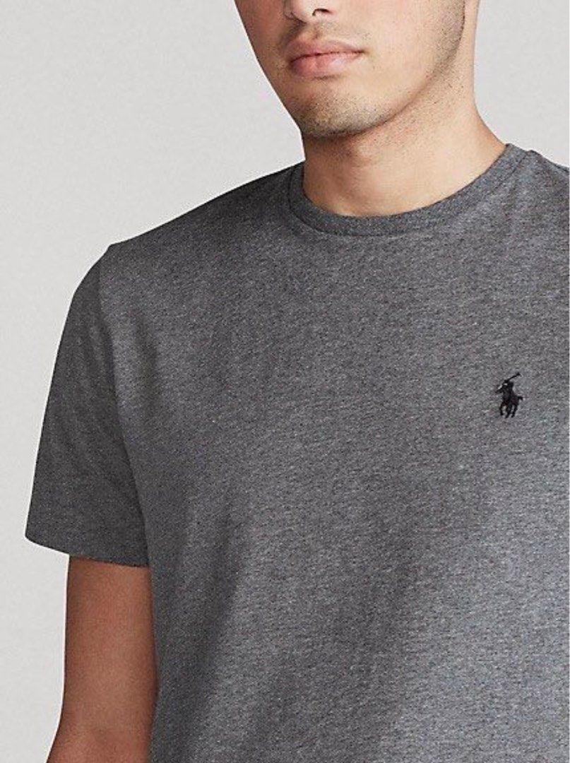 Polo Ralph Lauren t-shirt in grey (Category: Tshirts & Polo Shirts) located in Singapore. Submitted by gearacquisitionsyndrome (Listing ID 1378858234, Image 1). Description: Authentic Polo Ralph Lauren t-shirt in a classic grey color. Features the iconic polo player logo. Made in Indonesia. Custom Slim Fit. Size S. Perfect for casual wear. Brand new without tag. 18’’ shoulder to shoulder.