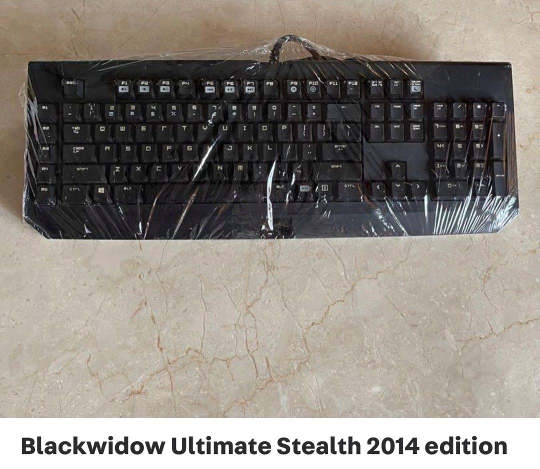 Razer Blackwidow Ultimate Stealth 2014 Edition (Category: Computer Keyboard) located in Singapore. Submitted by moilim (Listing ID 1378761863, Image 1). Description: Razer Blackwidow Ultimate Stealth 2014 Edition keyboard. Black color. The keyboard is wrapped in plastic. It is in good condition..