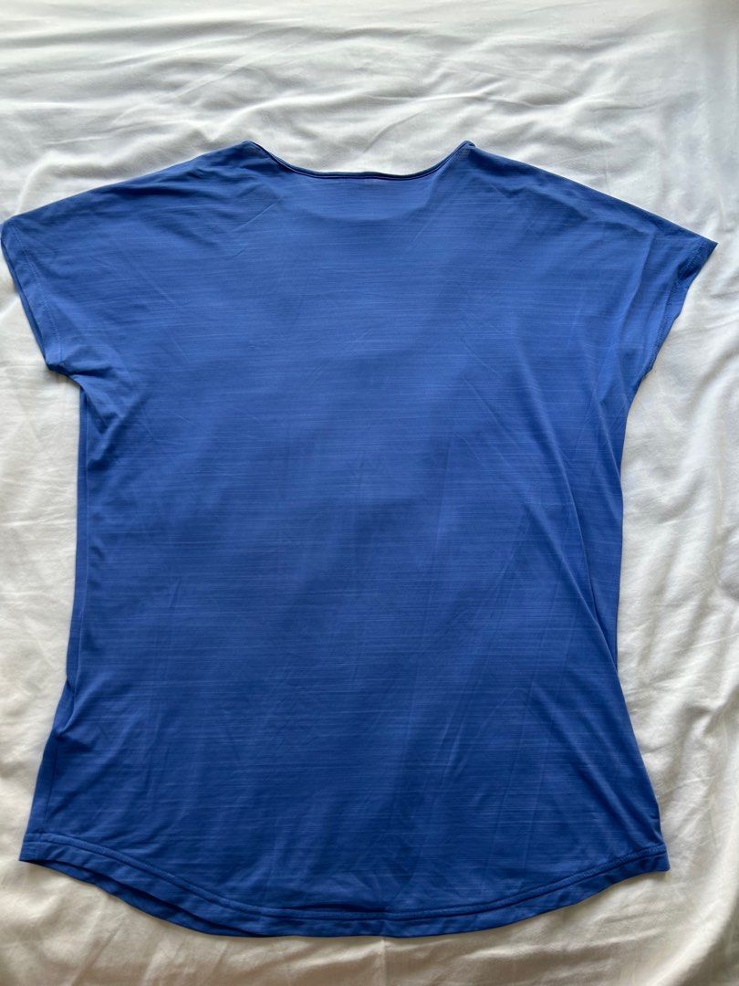 Reebok blue t Shirt (Category: Activewear) located in Singapore. Submitted by hennyturangan (Listing ID 1378874186, Image 2). Description: Thin cool material Ladies cut Price included tracked mail to sg address.