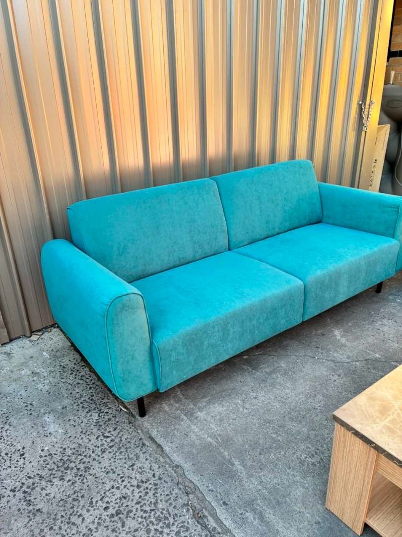 Sample Stella 3 Seater Sofa Pink & Teal Colour Selling in Half Price (Category: Furniture) located in Melbourne. Submitted by priceworthfurniture (Listing ID 1378763831, Image 3). Description: Price down from $1,499.99 to only $750 This is a sample items already assembled. Ex display item. No damage. Crafted with a durable wood frame and upholstered in a delightful pink fabric, this sofa exudes elegance and comfort. Spacious three-seater configur