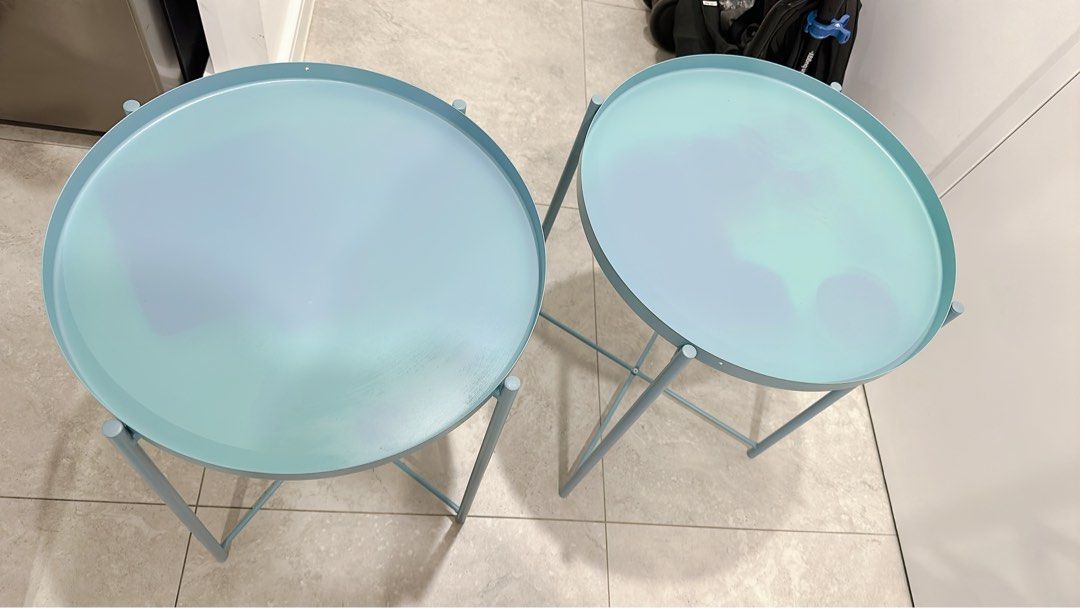 Set of Ikea GLADOM Tray table, blue, 45x53 cm (Category: Home Decor) located in Miranda. Submitted by abbie.corner (Listing ID 1378779792, Image 1). Description: Pick up from Kirrawee Beautiful colour, in very condition, the trays have some colour marks from using but looks more like ombré GLADOM Tray table, blue, 45x53 cm This colour is not on sale anymore Height: 53 cm Diameter: 45 cm Max. load: 10 kg You can use the removable tray for serving.