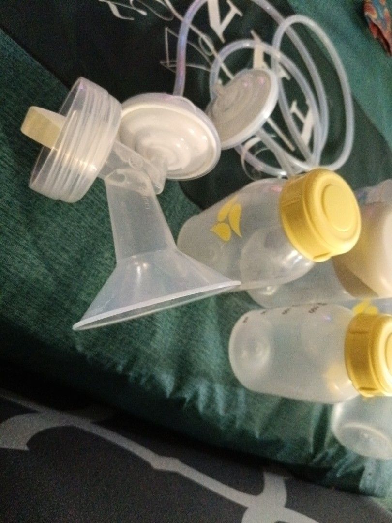 Spectra breast parts and tubing's. (Category: Breastfeeding & Bottle Feeding) located in Singapore. Submitted by mumtaz16hu39563 (Listing ID 1378850697, Image 1). Description: Medela breast milk bottles, spectra pump parts, and tubing. Clean and ready to use. Great for extra bottles or replacements. Bottles have measurement markings..