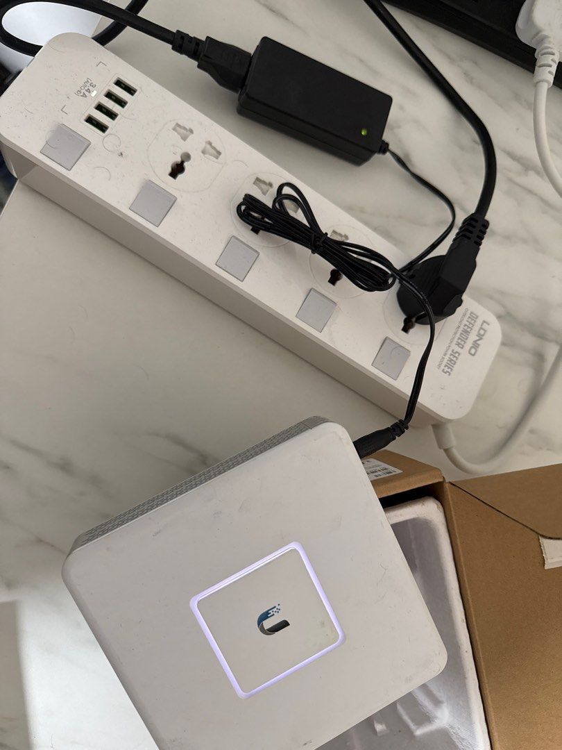 Ubiquiti UniFi Security Gateway (USG) (Category: Networking) located in Singapore. Submitted by cavijayan (Listing ID 1378643848, Image 3). Description: Ubiquiti UniFi Security Gateway (USG). Enterprise gateway router with Gigabit Ethernet. Includes Quick Start Guide. Perfect for home or small business network security. Comes with device and power cable. Box looks a little dirty from storage..