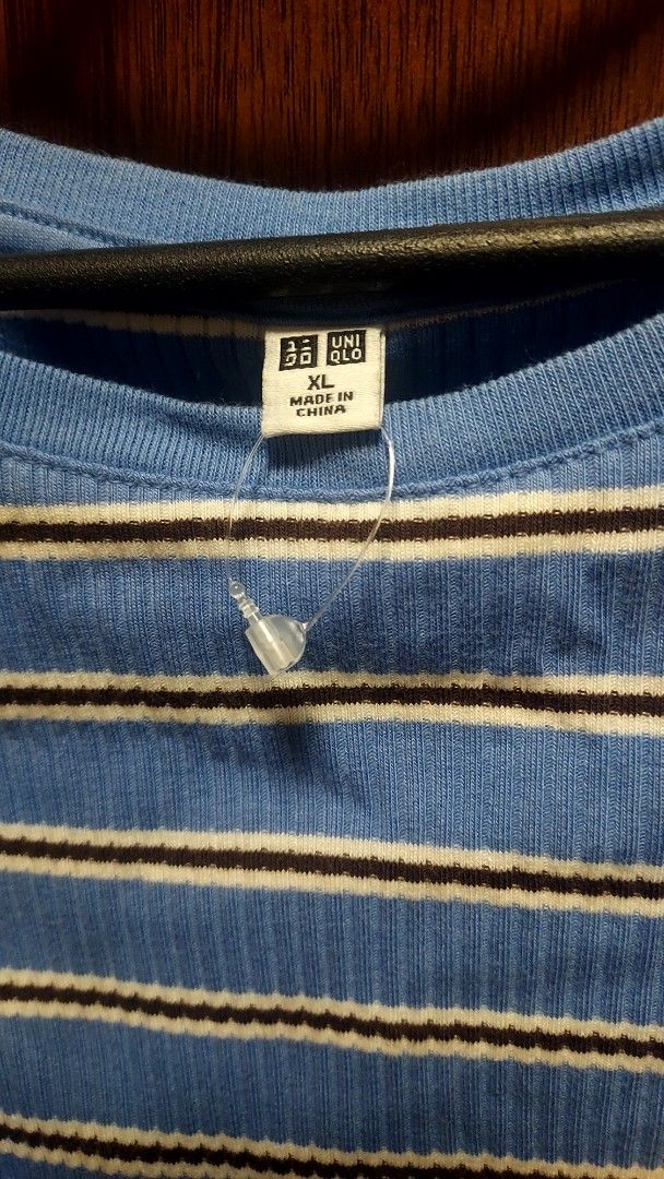 UNIQLO Stripes Shirt (Category: Blouses) located in San Juan City. Submitted by zaenligane (Listing ID 1378759248, Image 2). Description: XL in tag but fits XS to L.