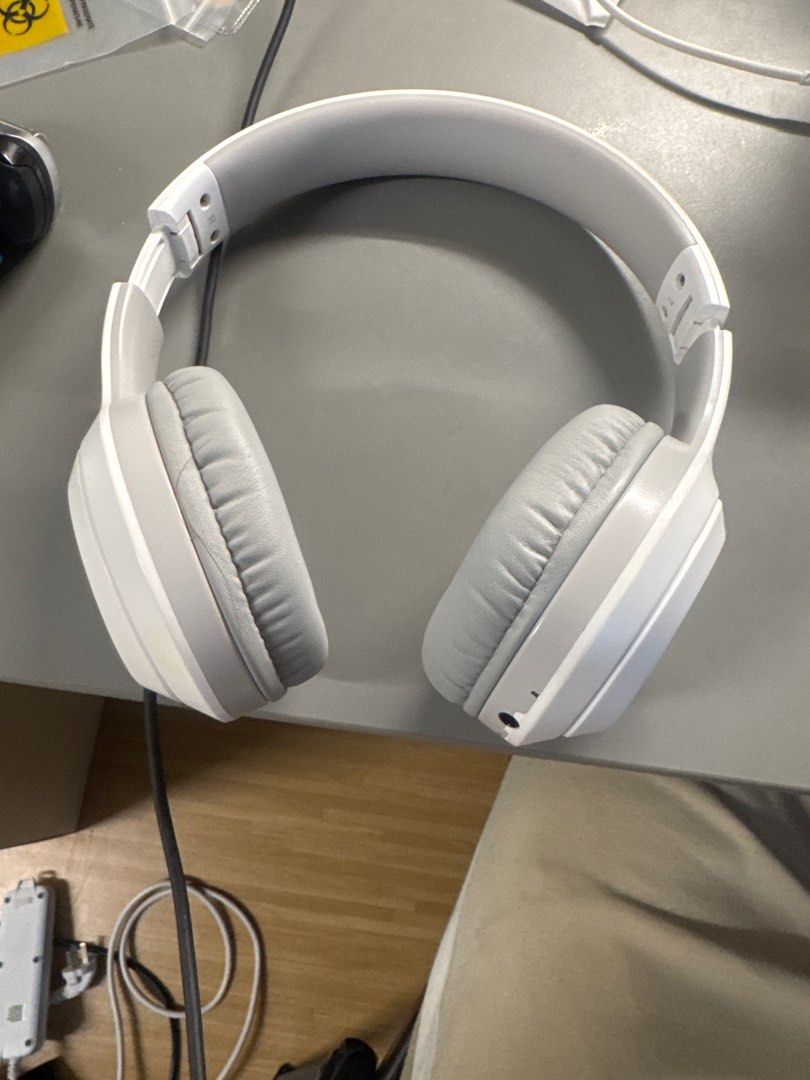 White Over-Ear Headphones (Category: Headphones & Headsets) located in Singapore. Submitted by smartntustudent (Listing ID 1378824400, Image 1). Description: These white over-ear headphones are in good condition. They have soft, grey earcups and a comfortable headband. The headphones have a wired connection. Perfect for listening to music or taking calls. .