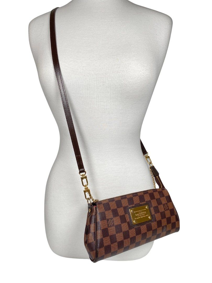 [ DEAL] Louis Vuitton Eva Clutch Damier Ebene Crossbody Pochette Bag Authentic Vintage (Category: Bags & Wallets) located in Singapore. Submitted by giantgiantic (Listing ID 1378934568, Image 2). Description: Lightly used Hardly reached out to this clutch. Selling to clear space Code: AA2150 Comes with crossbody strap and bag only No box or card Approx Measurements: 25x13x 4 (cm) Condition: 8.5/10 [ DEAL] Louis Vuitton Eva Clutch Damier Ebene Cro
