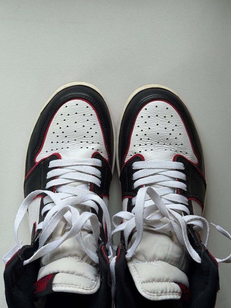Air Jordan 1 "Bloodline" (Category: Sneakers) located in Manila. Submitted by tlokai (Listing ID 1378967102, Image 3). Description: Air Jordan 1 “Bloodline” Size US 10.5M First owner Has crease and needs regluing, but still usable. Comes with OG box and 2 extra laces Asking price is ₱3990 Meetup for checking in SM Manila Foodcourt. .