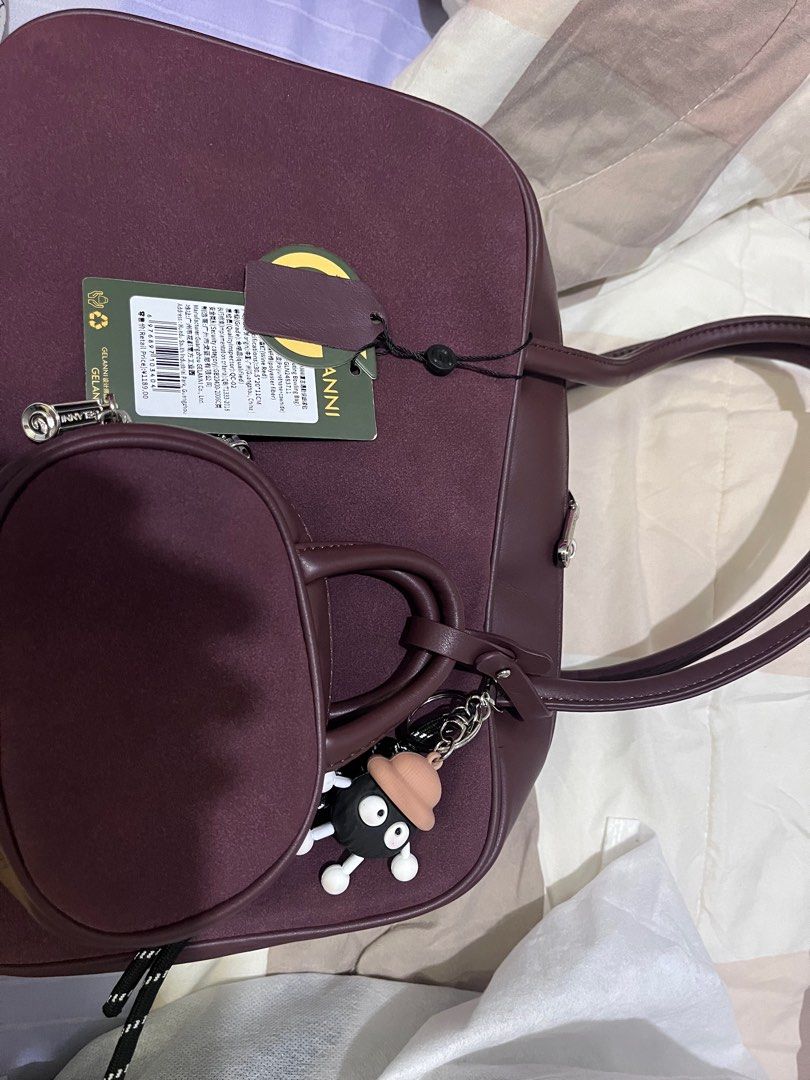 ANNI Handbag with Coin Purse - Brand New (Category: Bags & Wallets) located in Singapore. Submitted by wanshyuan014057 (Listing ID 1379073917, Image 1). Description: Brand new ANNI handbag with a matching coin purse. Features a spacious interior with a small zippered pocket. Comes with original tags and a cute charm. Perfect for everyday use or as a gift..