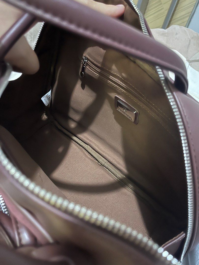 ANNI Handbag with Coin Purse - Brand New (Category: Bags & Wallets) located in Singapore. Submitted by wanshyuan014057 (Listing ID 1379073917, Image 3). Description: Brand new ANNI handbag with a matching coin purse. Features a spacious interior with a small zippered pocket. Comes with original tags and a cute charm. Perfect for everyday use or as a gift..