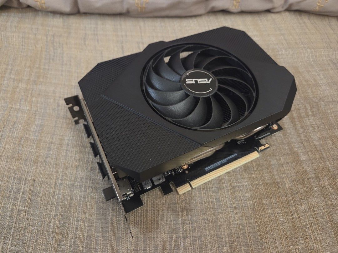 Used ASUS Phoenix GeForce RTX 3050 8GB GDDR6 Graphics Card (Category: Computer Parts) located in Singapore. Submitted by getzdex (Listing ID 1379077645, Image 3). Description: Selling due to upgrade. If you are looking for a good brand and stable graphic card, for some good gaming and work. This is the one to go, was playing GrayZone and other games and able to support well. - ASUS Phoenix GeForce RTX 3050 - 8GB GDDR6 memory - Working condition -