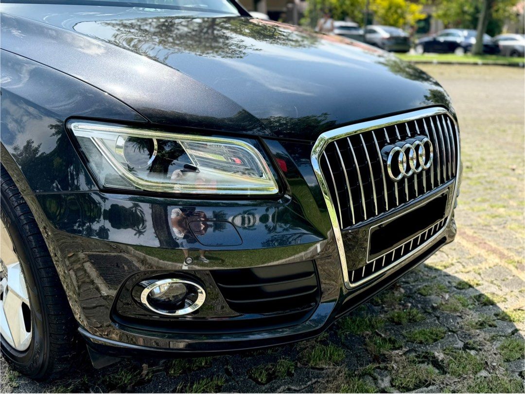Audi Q5 2.0A TFSI Quattro Auto (Category: Used Cars) located in Singapore. Submitted by carzioz (Listing ID 1379114063, Image 3). Description: Vehicle Features Responsive 2L 4 cylinders turbocharged engine mated with 8 speed tiptronic transmission producing 180Bhp with 320Nm of torque Accessories Multi Function Steering Wheel, paddle shift, driver electric seat, multi zone aircon, keyless, electric parking brake, cruise control. Description New a