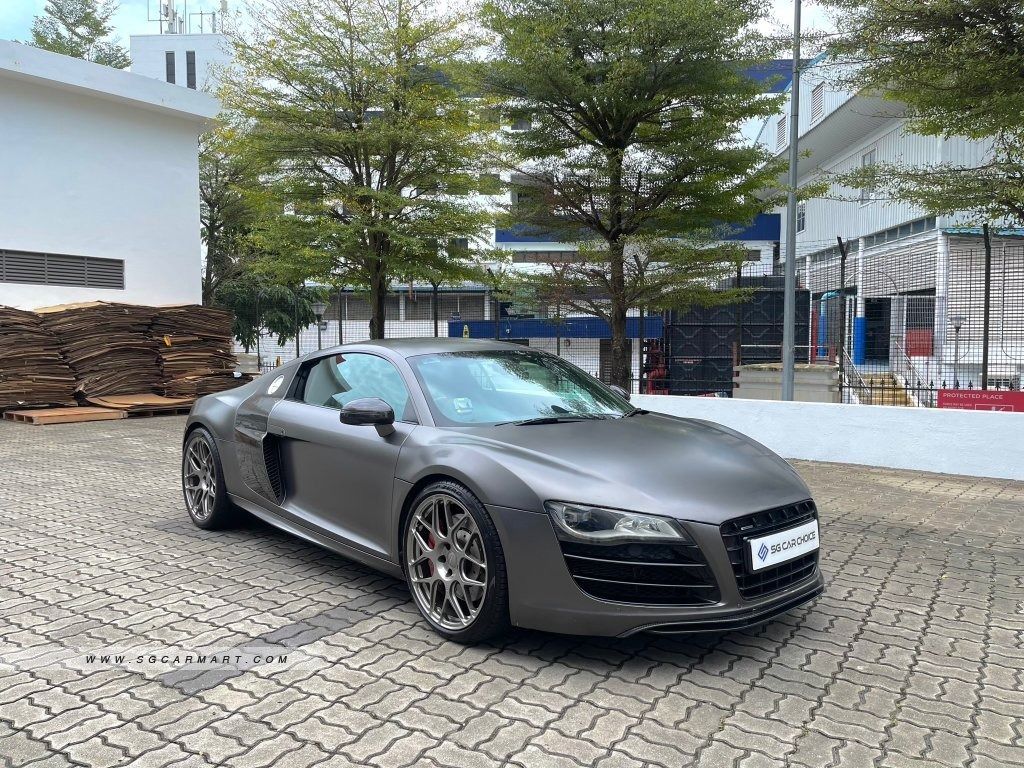 Audi R8 Coupe 5.2 FSI quattro S-tronic (A) (Category: Used Cars) located in Singapore. Submitted by easy_motor (Listing ID 1379101068, Image 1). Description: Car Model Audi R8 5.2A FSI Quattro R-tronic (COE till 01/2030) Asking Price $139,800 Depreciation $30,740 /yr Registration Date 22 Jan 2010 COE Remaining 4yrs 6mths 15days Engine Capacity 5,204 cc Gear Auto Fuel Type Petrol Mileage 98,720 km No. of Owners More than 6 Vehicle Features 5.2L V1