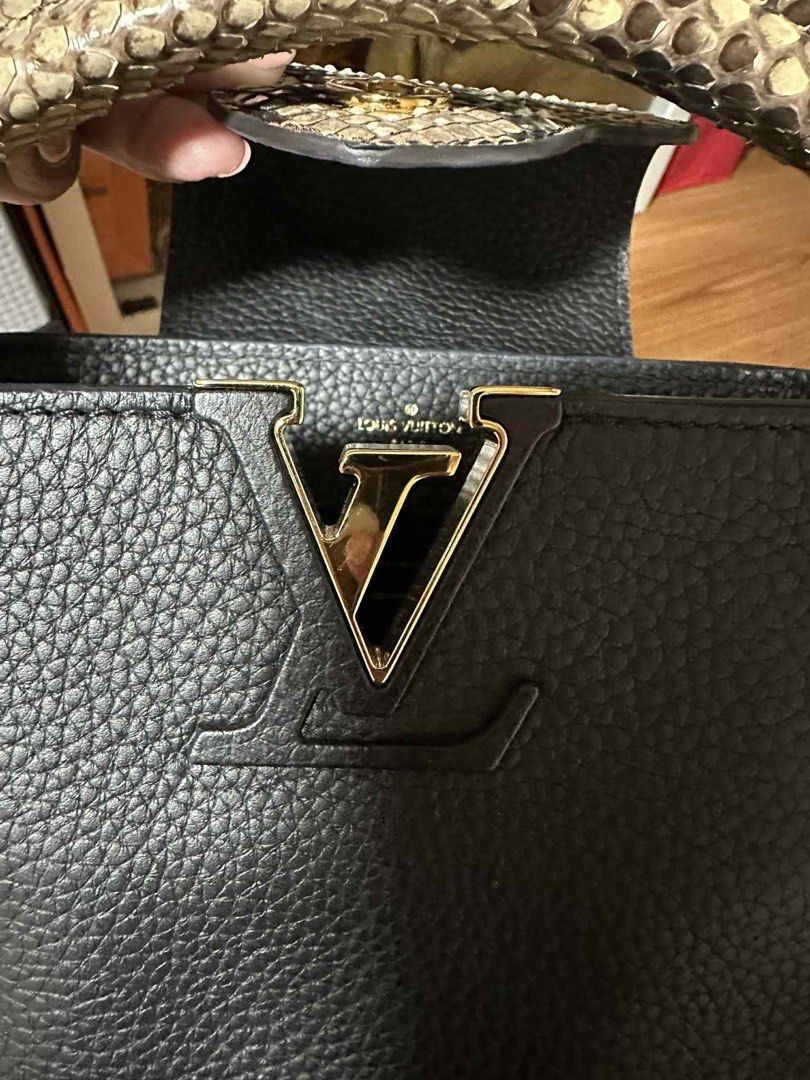Authentic LV mini capucine phyton (Category: Luxury Bags & Wallets) located in Quezon City. Submitted by jhaediah (Listing ID 1379082151, Image 3). Description: 😍mini capucine phyton Lightly used condition Inclusions: box, dustbag, strap code 16.