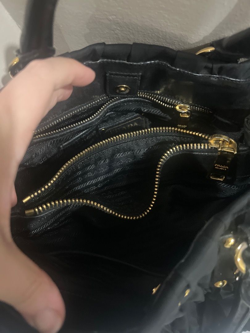 Authentic Prada Tessuto Gaufre (Category: Luxury Bags & Wallets) located in Caloocan City. Submitted by icecoco1977 (Listing ID 1379054111, Image 3). Description: Black authentic tessuto gaufre prada bag. Complete with authenticity card, nametag. With sling include.