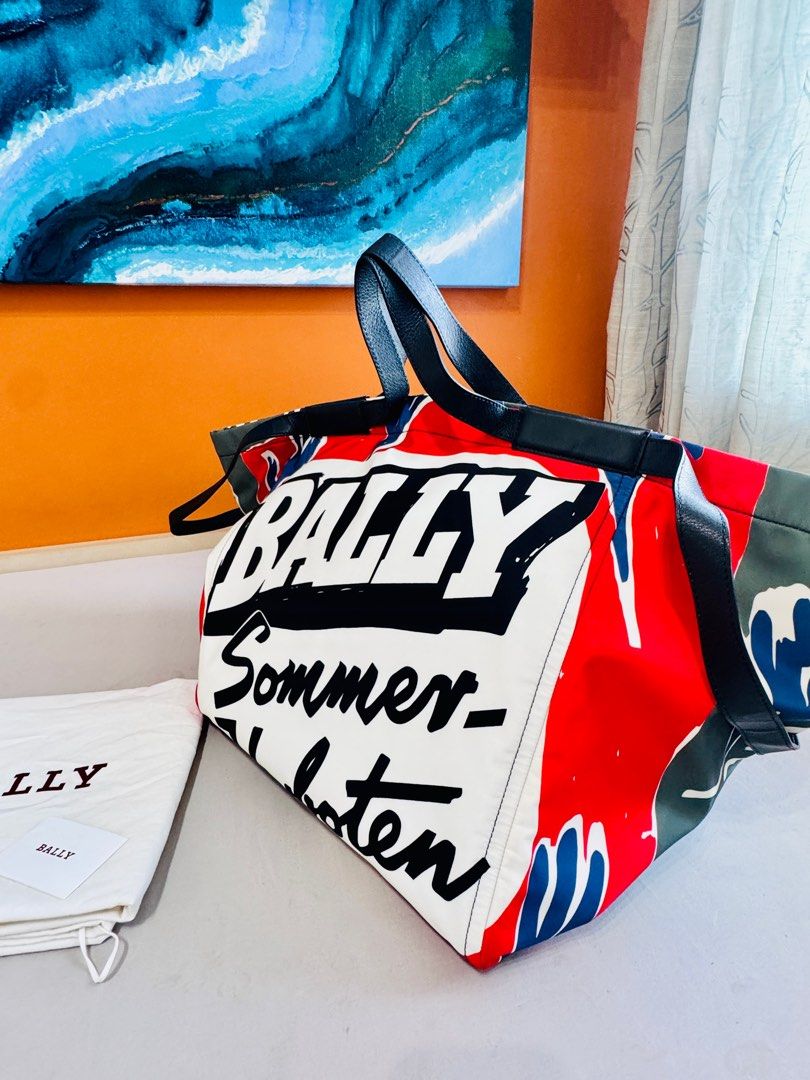 Bally Billboard Printed Tote Bag (Category: Luxury Bags & Wallets) located in Makati City. Submitted by ronehmer (Listing ID 1379023568, Image 2). Description: Purchased in Bally Siam Paragon Bangkok last 2023. Retail price runs at Php55-60k. Overnighter bag with a trapeze body, concealed magnetic fastening, two flat top handles and main compartment with two spacious pockets. Comes with original Bally dust bag and care card instructions. RFS: Bag