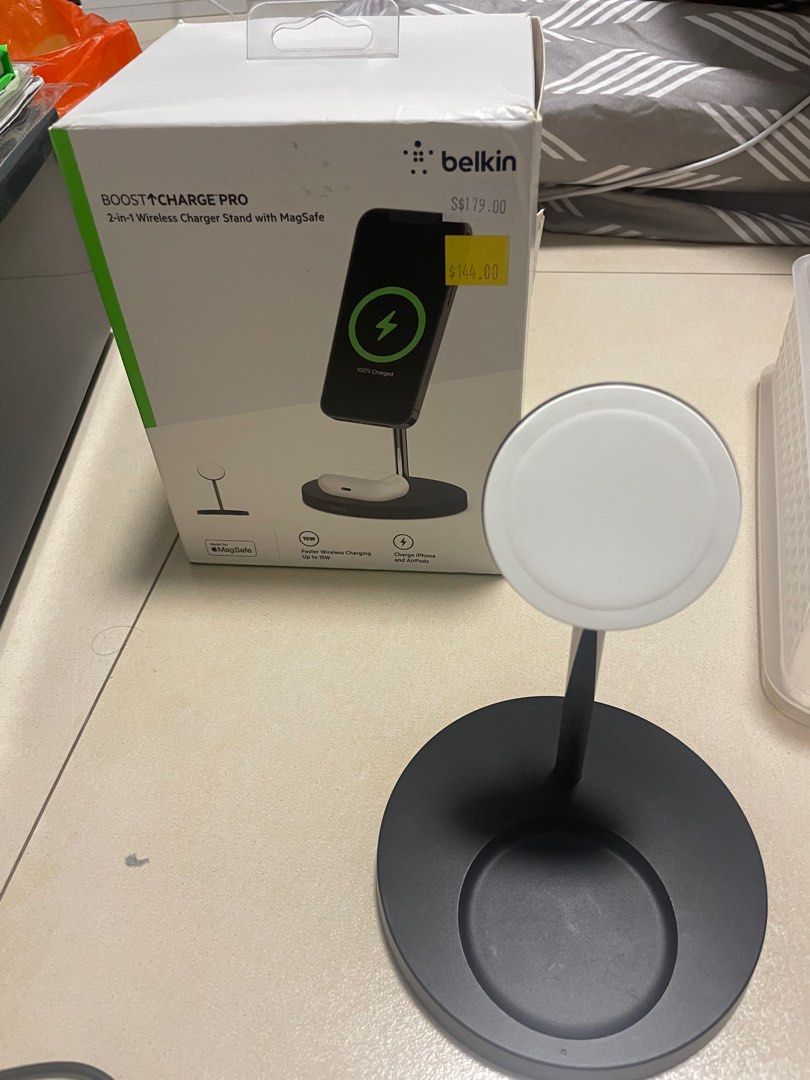 Belkin BOOST CHARGE PRO 2-in-1 Wireless Charger (Category: Chargers & Cables) located in Singapore. Submitted by giantdefyer (Listing ID 1379091980, Image 1). Description: Selling a Belkin BOOST↑CHARGE PRO 2-in-1 Wireless Charger Stand with MagSafe. Comes with the original box and receipt from iStudio. Purchased on 12 Feb 2022. Charger is in excellent condition. Supports iPhone 15W and AirPods 5W charging. Collection location: Anywhere near or be