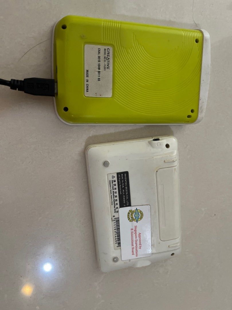 BESTA ALL PASS-2 and CREATIVE zPAL 100 (Category: Other Gadgets) located in Singapore. Submitted by happygolucky1.6 (Listing ID 1378942742, Image 1). Description: Includes a USB cable. Tested and working. The device is in good condition, with some signs of wear. Please refer to the photos for details. Self collection at Tiong Bahru MRT.