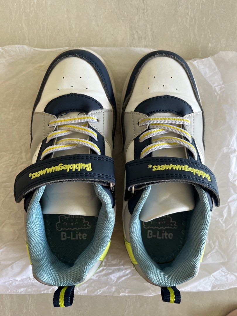 //please pay me directly Not via Carousell as seeing scam buyer//Bubblegummers B-Lite Sneakers - Size 11.5 (Category: Babies & Kids Fashion) located in Singapore. Submitted by tamaiyoko2015 (Listing ID 1378974956, Image 2). Description: - Bubblegummers B-Lite sneakers - Size: 11.5 - Excellent condition - Velcro strap for easy wear - Vibrant color scheme - Perfect for everyday or special occasions - Comes with original box.