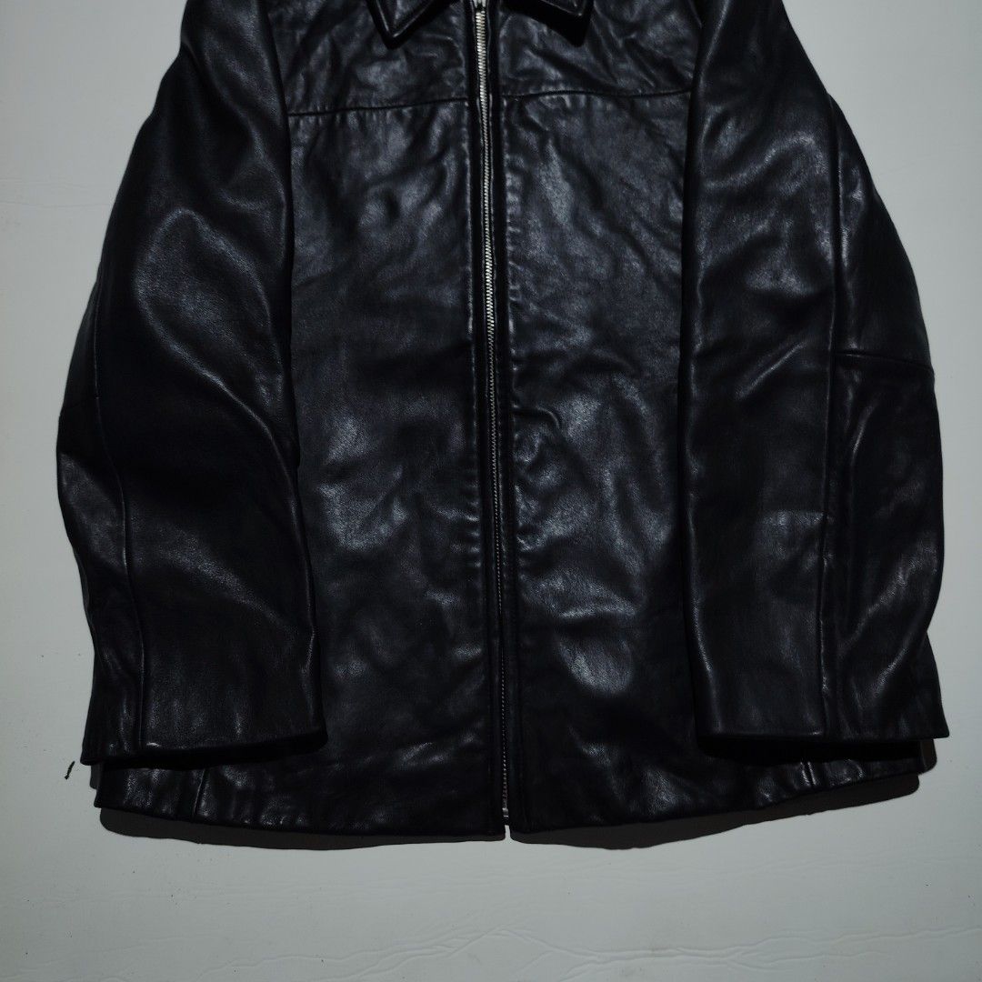 CAPACCI BLACK LAMBSKIN MOTO RACER LEATHER JACKET (Category: Coats, Jackets and Outerwear) located in Dinalupihan. Submitted by aizzeestuffs (Listing ID 1379087617, Image 3). Description: Material: Lambskin Leather Length : 26" Width :19" Shoulder : 17 " Sleeves : 22" Color may vary due to lighting. PM for more details..