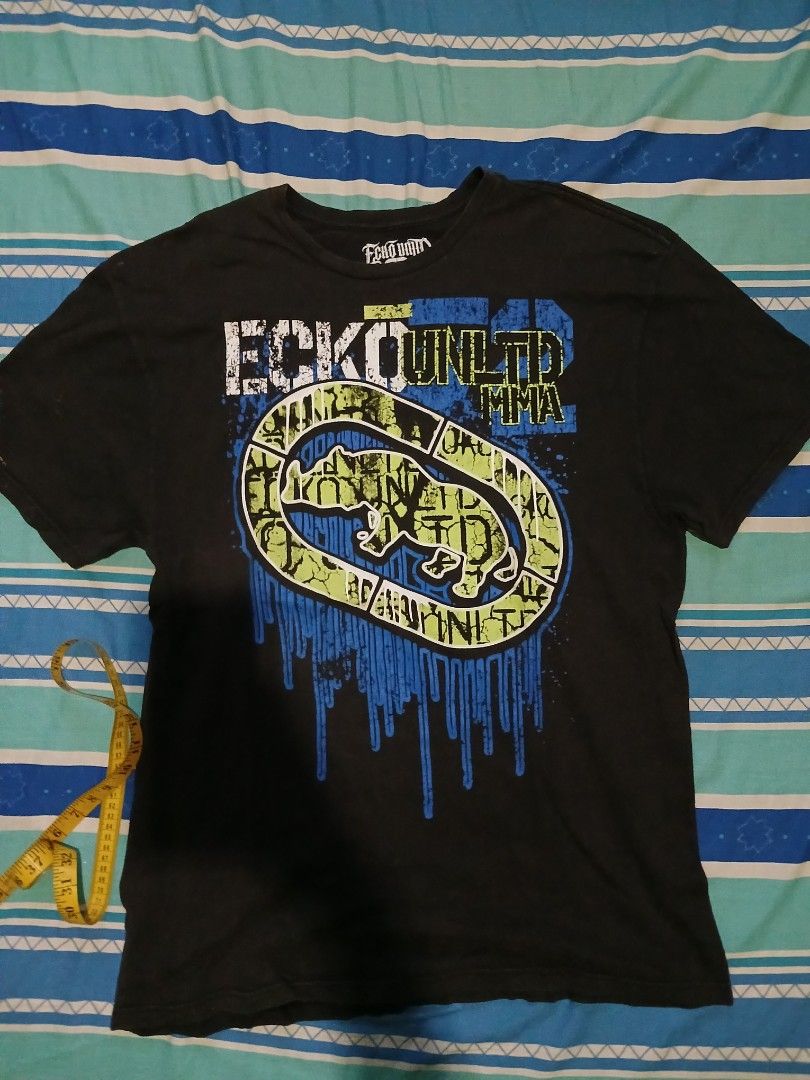 Ecko Unltd MMA Tee (Category: Tshirts & Polo Shirts ) located in Taguig. Submitted by mallowset (Listing ID 1379080403, Image 1). Description: width - 22 length - 31.5 issue: few stains on sleeve.