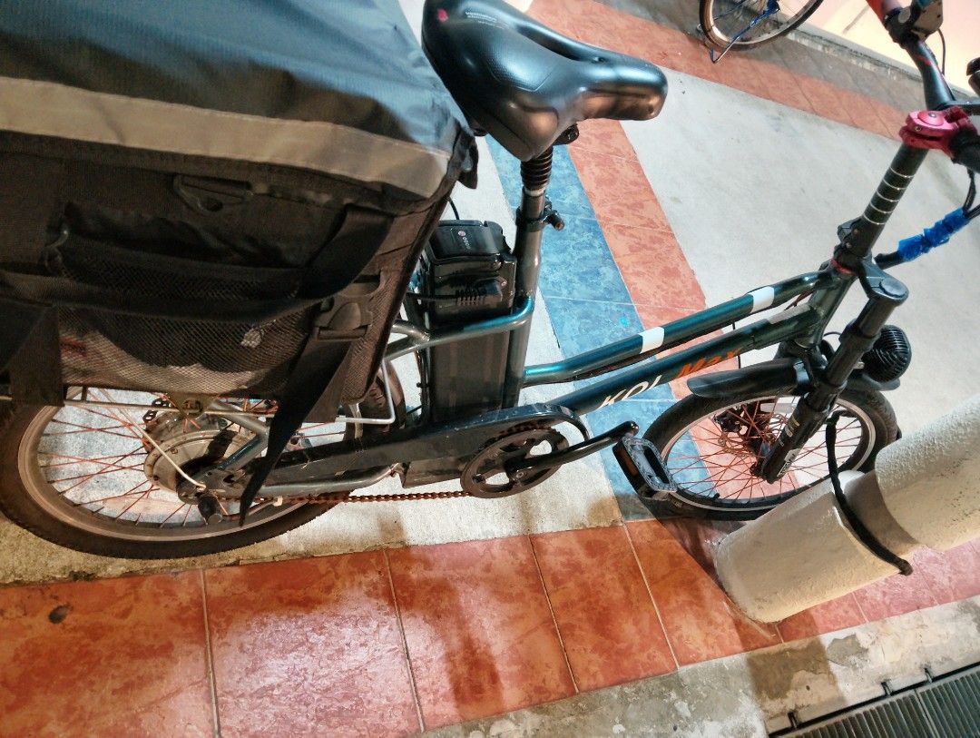 Ebike (Category: E-Scooters & E-Bikes) located in Singapore. Submitted by meijinx (Listing ID 1379105844, Image 2). Description: kol max plus ebike key ignition extended stem handlebars thumb throttle thermal bag & helmet included also 48v battery 14.4ah made in 2021 never cut off before. 250w stock motor well used for food delivery for 3 years, selling as I am starting full time job... quitting grab food totally. there no paddle assist, only thr