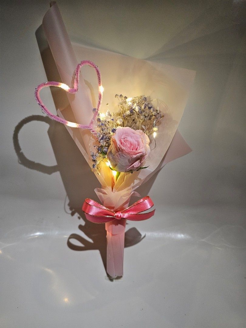 Flower bouquets (Category: Garage sale) located in Singapore. Submitted by wenjia07 (Listing ID 1379082301, Image 3). Description: 1. 7 Tulips twisted wire-25sgd 2. 520 cash flowers-588sgd 3. Single stalk fresh pink rose-18sgd 4. 5 stalk fresh pink rose-35sgd 5. single stalk soap rose-10sgd 6. 3 stalk soap pink rose-20sgd 7. dry wheat flower basket-38sgd 8. mini orange flower twisted wire-25sgd 9. 7 pink roses twisted wire-25sgd 10. foam rose but