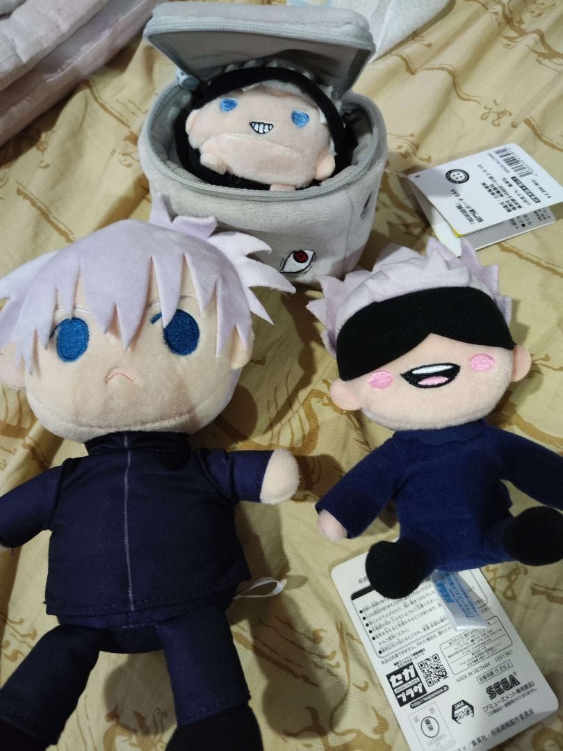 Gojo Satoru Plush Toys (Category: Plushies & Soft Toys) located in Manila. Submitted by clawyyy (Listing ID 1379046138, Image 3). Description: Decluttering Gojo stuffed toys, PM to discuss price. All original. Most have tags intact. Displayed in cabinet. Can buy individually. Shipping via Lalamove/JnT/GGX at buyer's expense. Manila location..