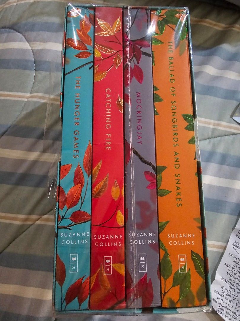 Hunger Games Deluxe Boxset (Category: Storybooks) located in Mandaluyong City. Submitted by marilovesbooks (Listing ID 1378963437, Image 2). Description: from amazon semi sealed. not yet open. individual pics cant be done unless sure buyer..