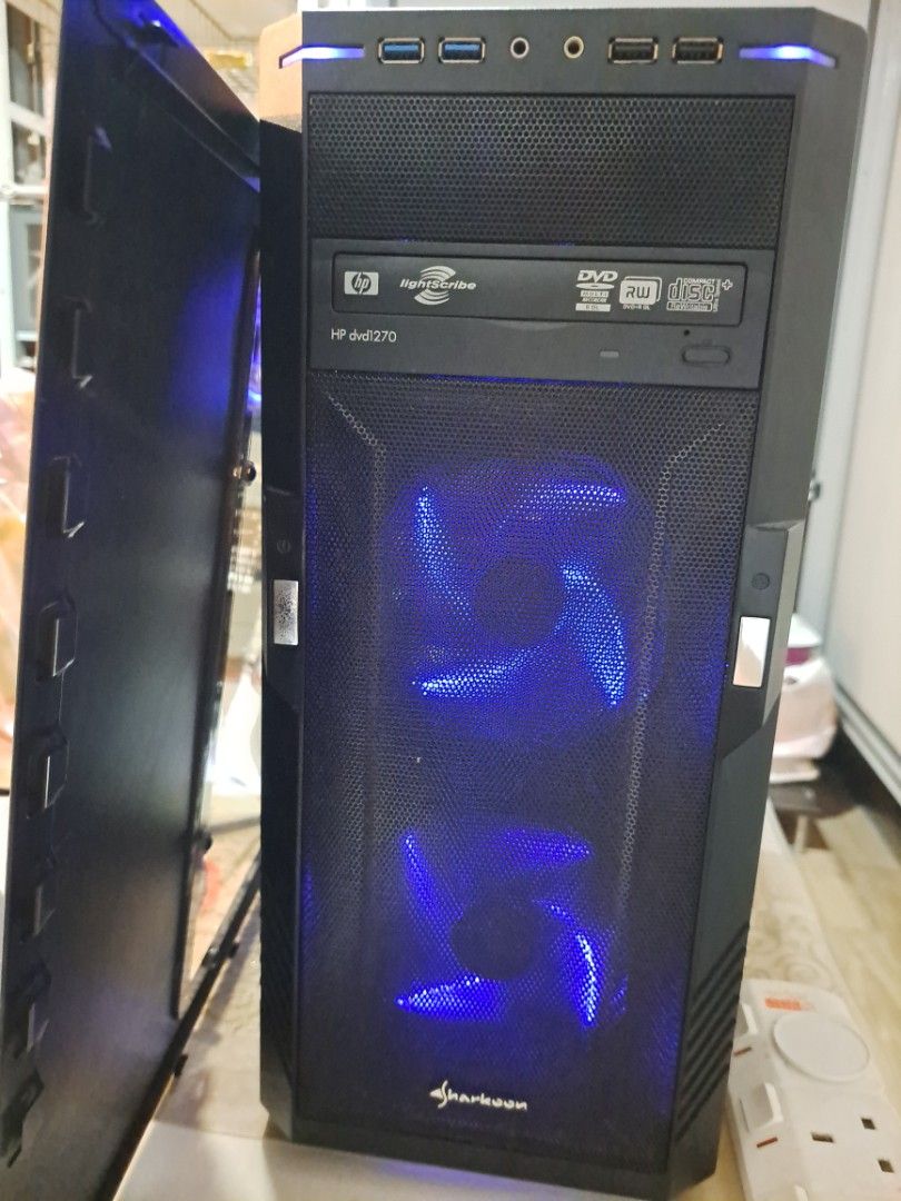 I7 gaming pc with ssd and gtx 730 housed in a Sharkoon PC Case with Blue LED Fans (Category: Garage sale) located in Singapore. Submitted by korail (Listing ID 1379074478, Image 1). Description: - Used gaming pc - Blue LED fans - Includes DVD drive - Power supply included - I7 4770k 16gb ram 256gb ssd 2tb hdd gtx 730 - Ports: USB, audio, display outputs - Perfect for budget PC gaming.