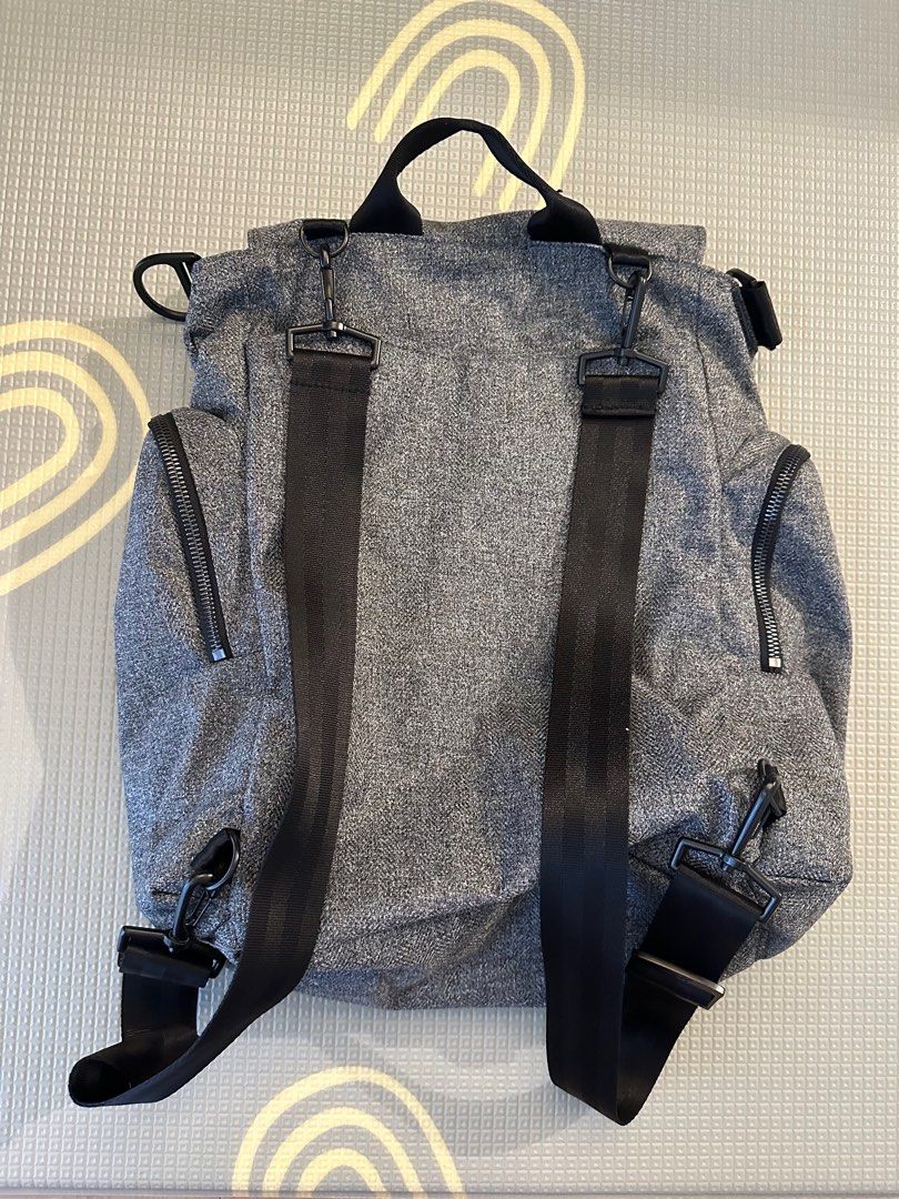 JuJuBe BFF Diaper Bag - Gray (Category: Diaper Bags & Wetbags) located in Singapore. Submitted by stephx (Listing ID 1379023349, Image 2). Description: Stylish and functional JuJuBe BFF diaper bag in gray. Features multiple compartments and pockets for organization. Includes backpack straps and a top handle for versatile carrying options. Zippers are in good condition. Great for parents on the go!.