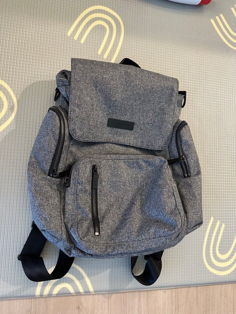 JuJuBe BFF Diaper Bag - Gray (Category: Diaper Bags & Wetbags) located in Singapore. Submitted by stephx (Listing ID 1379023349, Image 1). Description: Stylish and functional JuJuBe BFF diaper bag in gray. Features multiple compartments and pockets for organization. Includes backpack straps and a top handle for versatile carrying options. Zippers are in good condition. Great for parents on the go!.
