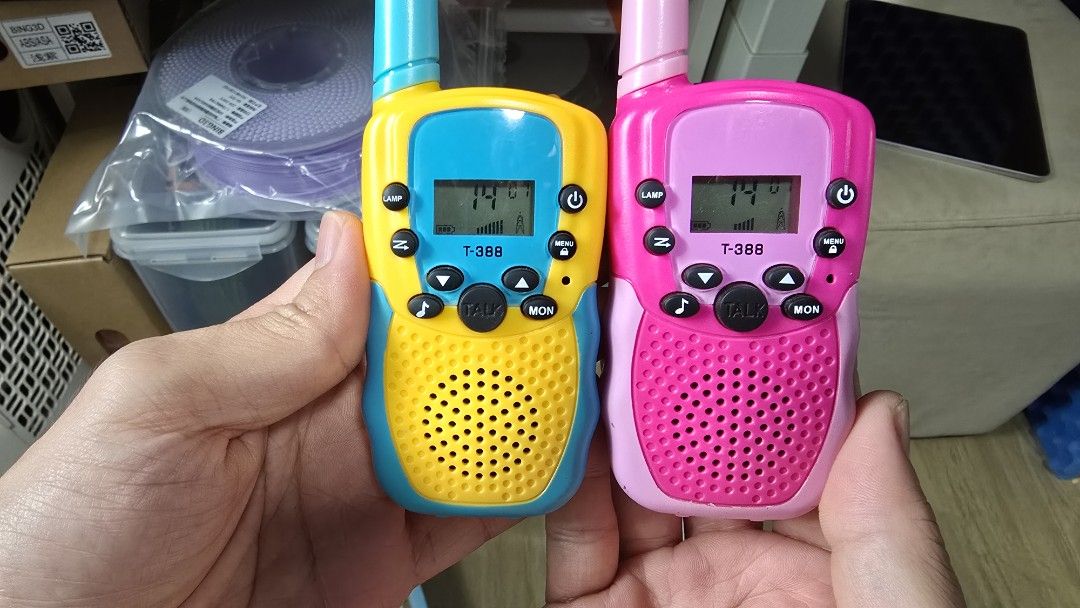 Kids' T388 Walkie Talkies 2pcs - 22 channels (Category: Walkie-Talkie) located in Singapore. Submitted by meiccm (Listing ID 1378936887, Image 1). Description: - Set of two walkie talkies (yellow and pink). - In good working condition, easy to set and use. - Fun for kids indoors and outdoors. - Batteries not included. - Push to talk. - Bought it online for $20++, selling at half price $10. - Self collect at Sengkang, or top up $2.5 for mailing. .