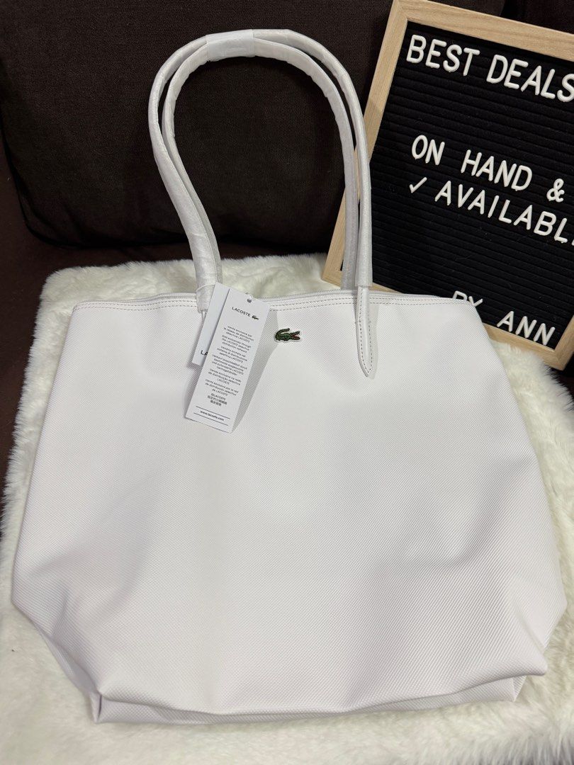 Lacoste Large Tote Bag (Category: Tote Bags) located in Paranaque City. Submitted by markkann (Listing ID 1378936251, Image 2). Description: Onhand Brand New and Original Lacoste Large Tote Bag Items were bought from the US Available Colors: - White (vertical) - Black (horizontal) - Beige (horizontal) - Blue (horizontal).