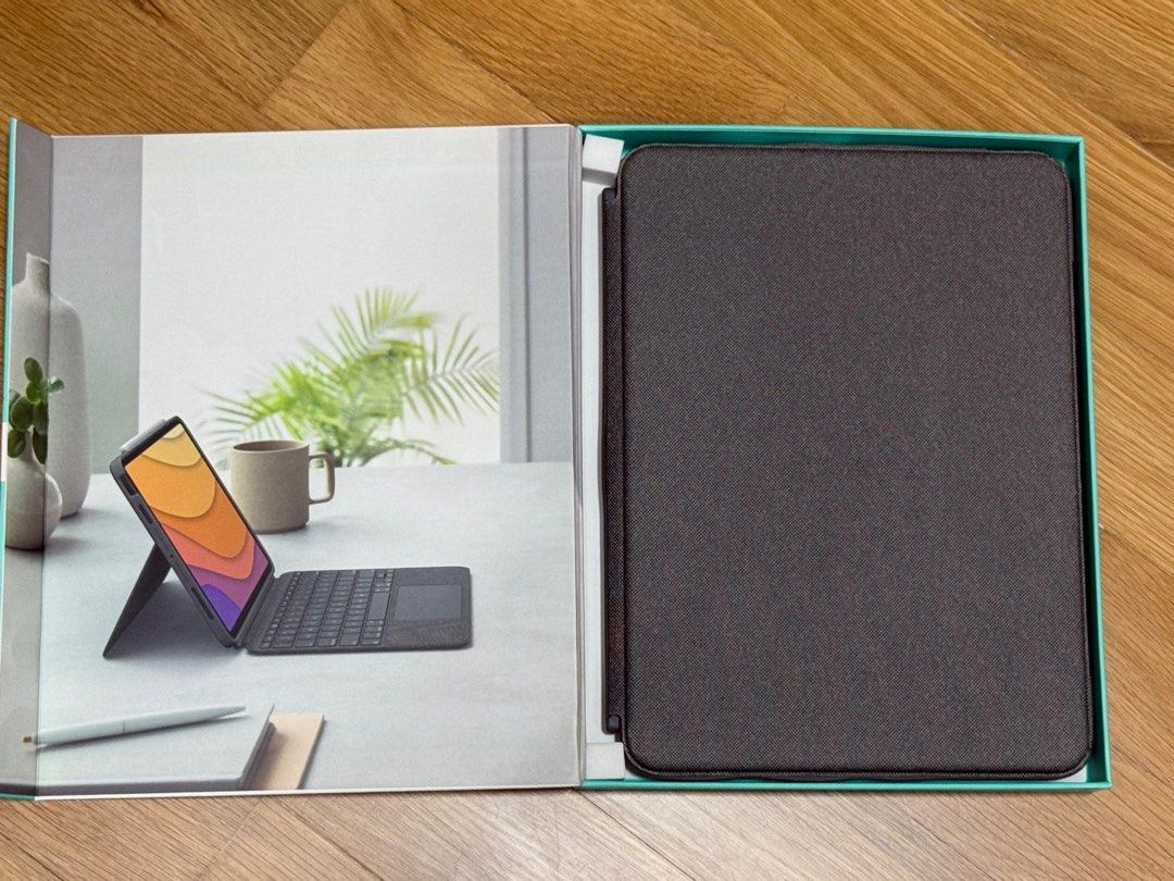 Logitech Combo Touch Keyboard Case for iPad Air (4th Gen) (Category: Cases & Sleeves) located in Singapore. Submitted by unimatrix17 (Listing ID 1379092455, Image 3). Description: Logitech Combo Touch keyboard case for iPad Air (4th generation). Detachable keyboard with trackpad with smart connector, no need charging or pairing. The case is in good condition, and fully functional. Please view images for condition. Comes with original packaging. P