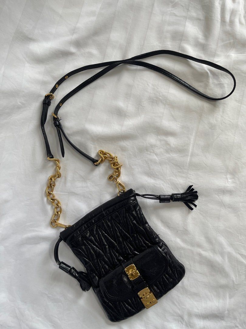 MIU MIU - Mini Leather Cross-Body Bag (Category: Luxury Bags & Wallets) located in Cavite. Submitted by second_story_ph (Listing ID 1378964094, Image 1). Description: MIU MIU - Mini Leather Cross-Body Bag MADE IN TURKEY Code: 194 Material: Leather + Metal Dimension: 5” Width / 6” Height Fit to your daily essentials cute size Condition: Excellent A no major issue sign of use only please check detailed pics. Reasonable price. Authentic JnT / Lalamo