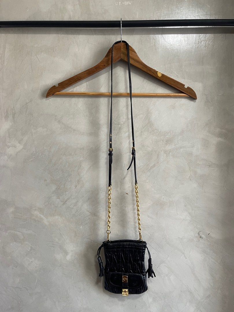MIU MIU - Mini Leather Cross-Body Bag (Category: Luxury Bags & Wallets) located in Cavite. Submitted by second_story_ph (Listing ID 1378964094, Image 3). Description: MIU MIU - Mini Leather Cross-Body Bag MADE IN TURKEY Code: 194 Material: Leather + Metal Dimension: 5” Width / 6” Height Fit to your daily essentials cute size Condition: Excellent A no major issue sign of use only please check detailed pics. Reasonable price. Authentic JnT / Lalamo