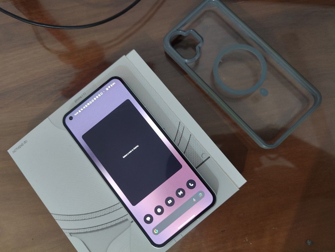 Nothing Phone (1) - 8GB RAM, 256GB Storage (Category: Android Others) located in Singapore. Submitted by arunshappyplace (Listing ID 1379100147, Image 1). Description: - Selling a Nothing Phone (1) in excellent condition. - Comes with the original box. - Includes a clear protective case. - Phone is well-maintained. - No scratches or dents. - Ready for a new owner! What you see is what you get. Reach out to discuss a deal..