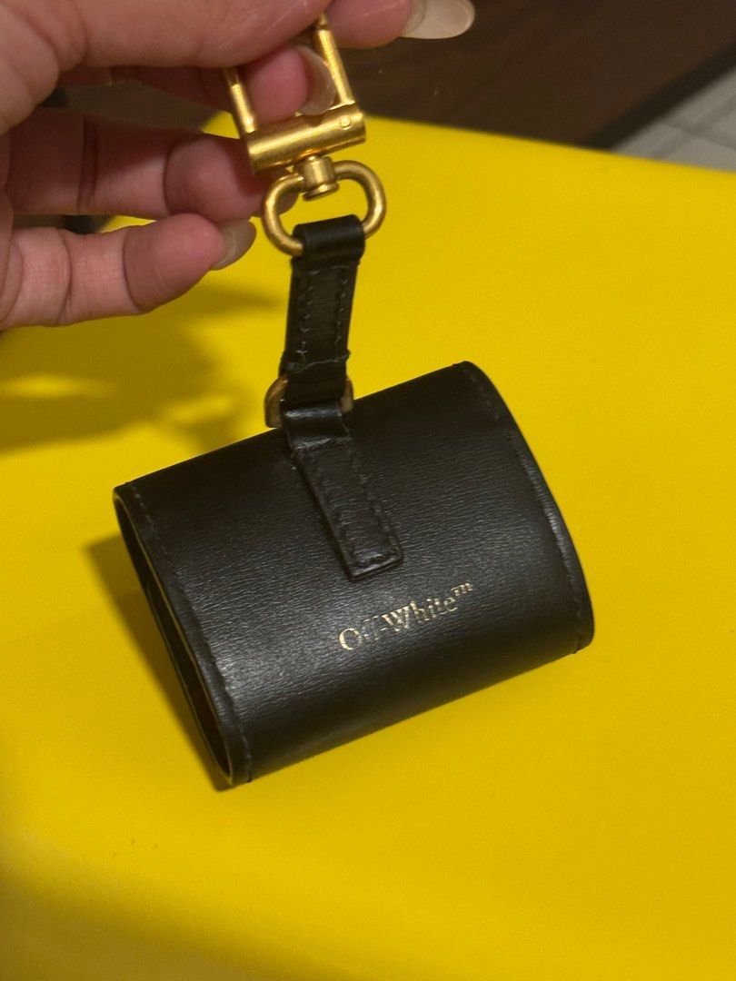 Off-White Arrows Motif Earphone Case (Category: Cases & Sleeves) located in Singapore. Submitted by meowbuy (Listing ID 1379117974, Image 3). Description: Authentic Off White airpod case bought from Farfetch. Moderately used. Self collect at cck 680215 or Midview City.