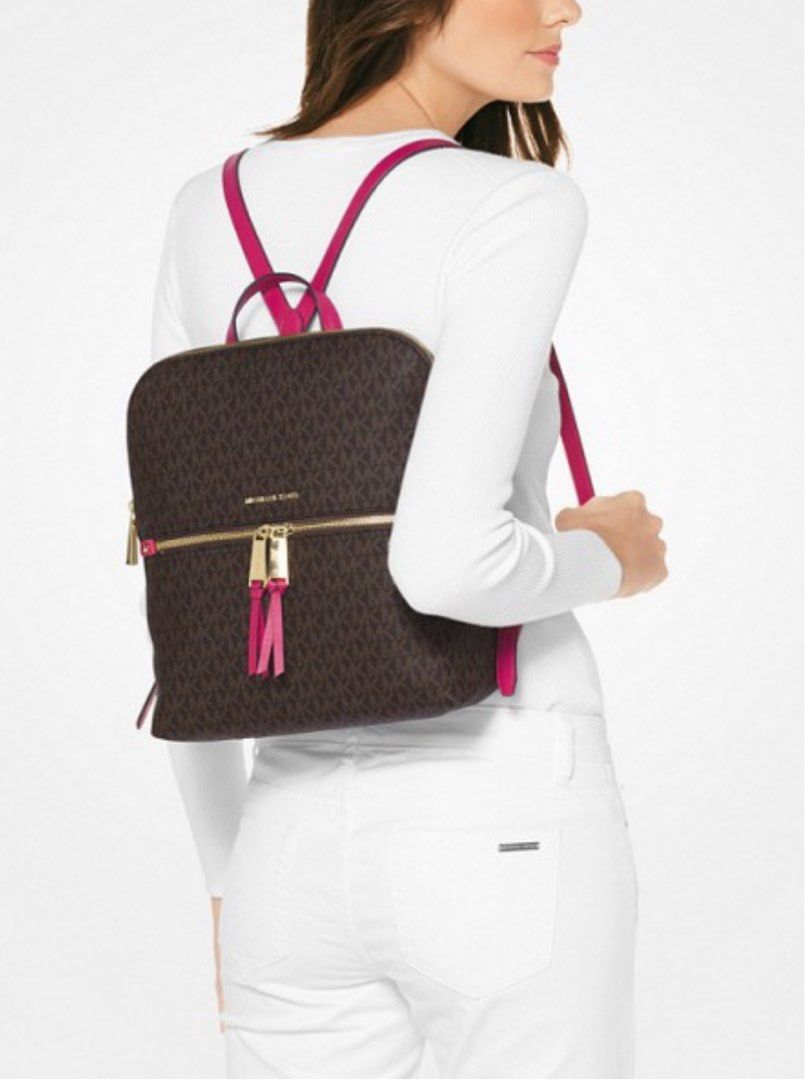 Original Michael Kors Rhea Medium Slim Backpack (Category: Backpacks) located in Malabon City. Submitted by love2shopmanila (Listing ID 1378932378, Image 3). Description: Original MK from US Location: Malabon City.