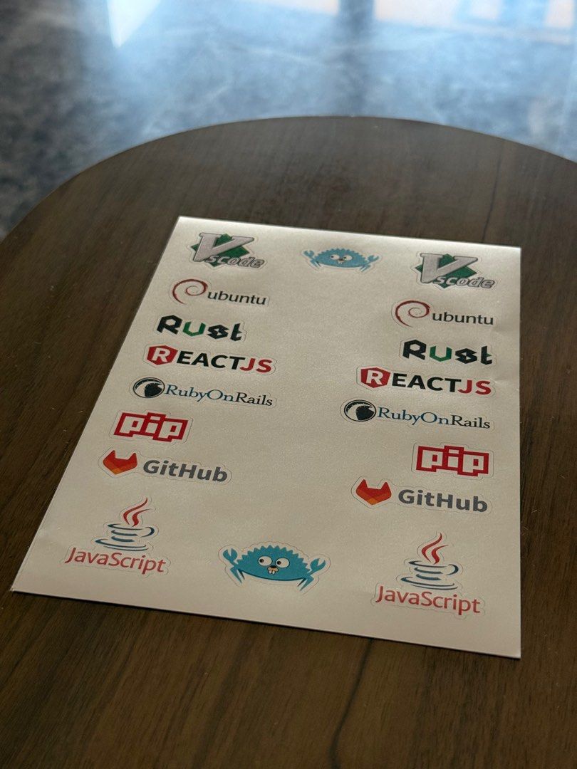 Parody Prank Tech Coding Stickers Misbrand - ReactJS, JavaScript, VS Code, etc. (Category: Art & Prints) located in Singapore. Submitted by zinex (Listing ID 1378987787, Image 2). Description: Stickers size: around 3-5cm Water resistant, suitable for laptops, bottles, etc. Comes as a set of 2 stickers for each logo. Inject some chaos and humor into your tech life with Misbrands—the notorious sticker collection that turns your favorite developer t