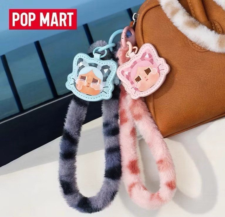 POP MART Wild Cutie Phone Keychain (Category: Other Gadgets) located in Singapore. Submitted by circlestripes (Listing ID 1378946988, Image 1). Description: Adorable POP MART cat keychains. Features a cute cat face design with a fluffy tail strap. Perfect for adding a touch of charm to your bag or keys. Available in Denim Cutie (Blue) .