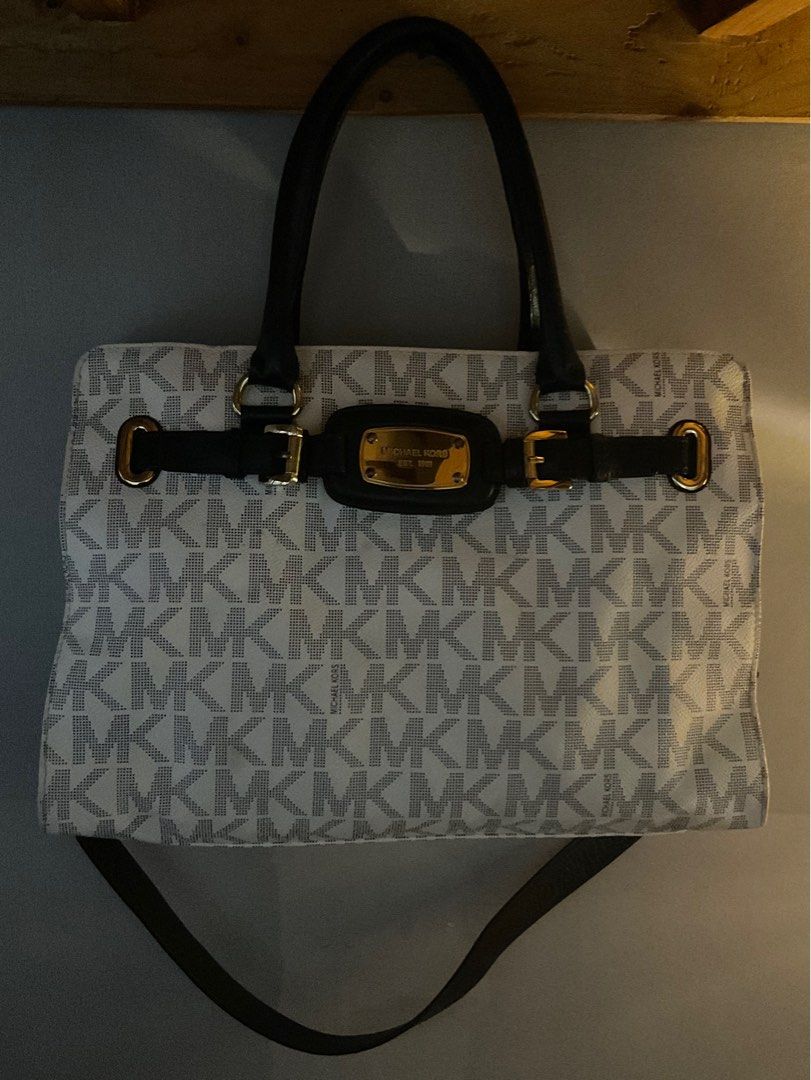 Preloved MK Hamilton (Category: Luxury Bags & Wallets) located in Makati City. Submitted by gclutters (Listing ID 1379115349, Image 1). Description: Super mura nalang. Negotiable pa RFS: nag c commute nalang papunta sa school, mabigat yung bag itself.